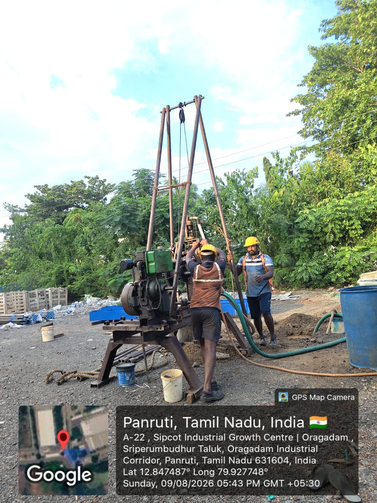 Field technicians operating a soil investigation drilling rig at an Oragadam industrial site