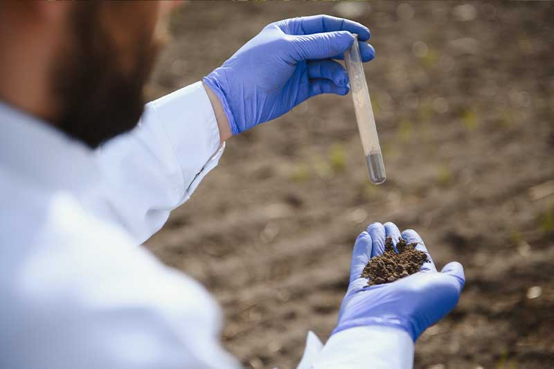 Engineers reviewing soil investigation data, representing GeoDesign’s mission